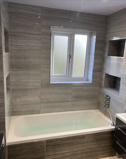 Immaculate tiling and plastering work